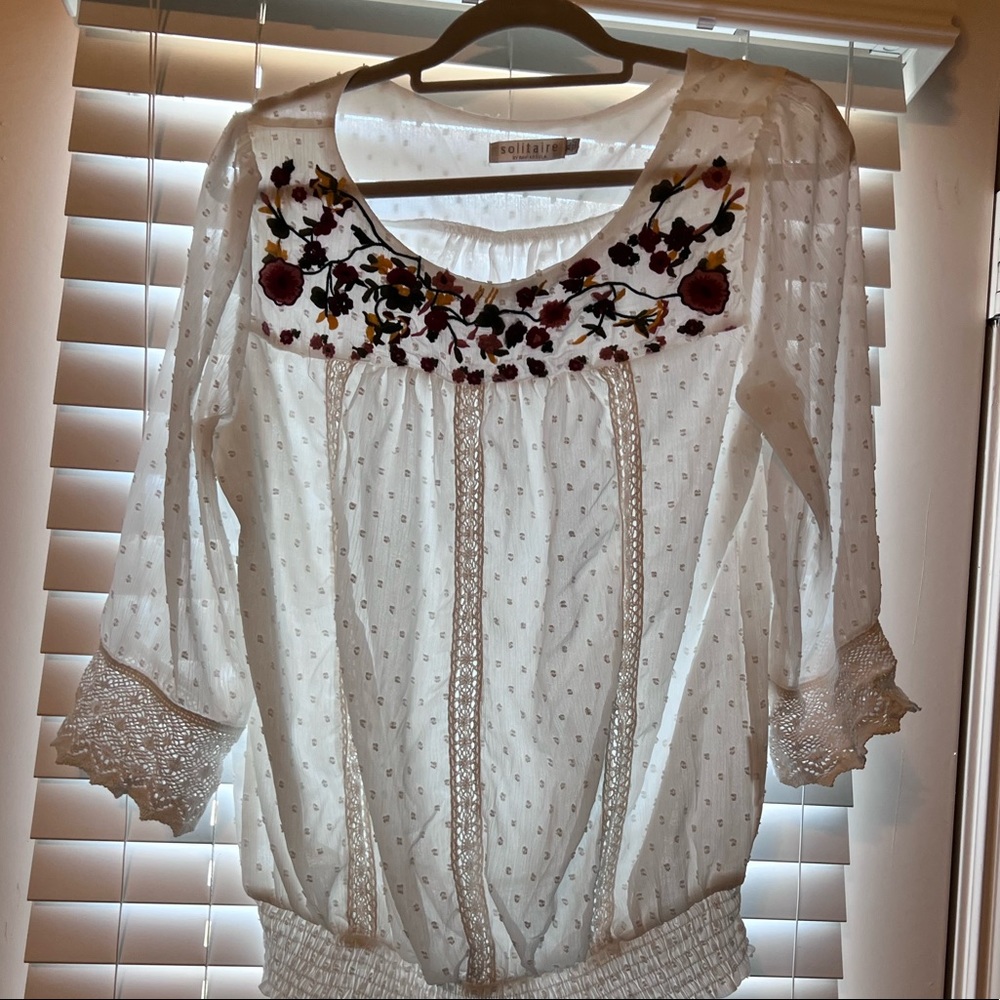 Solitaire white blouse with flower embroidery